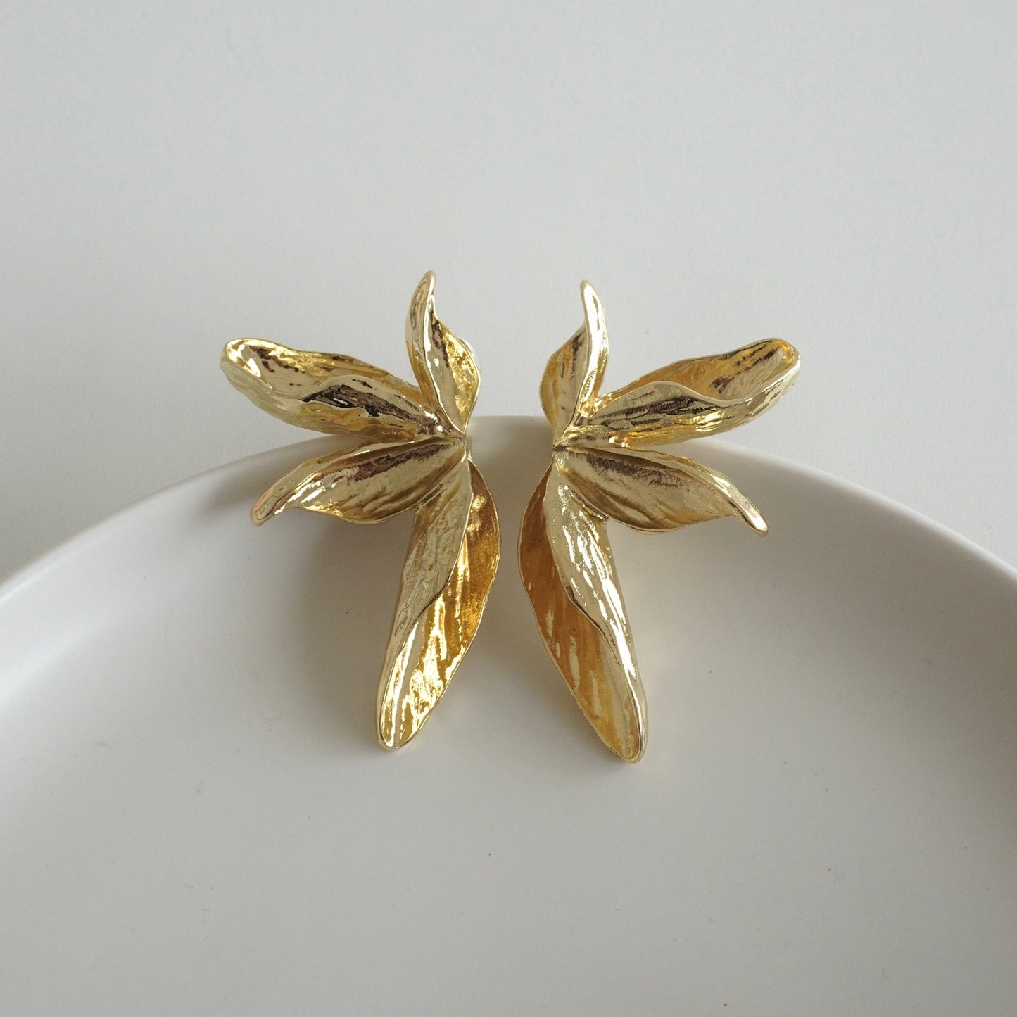 Aretes media flor jumbo