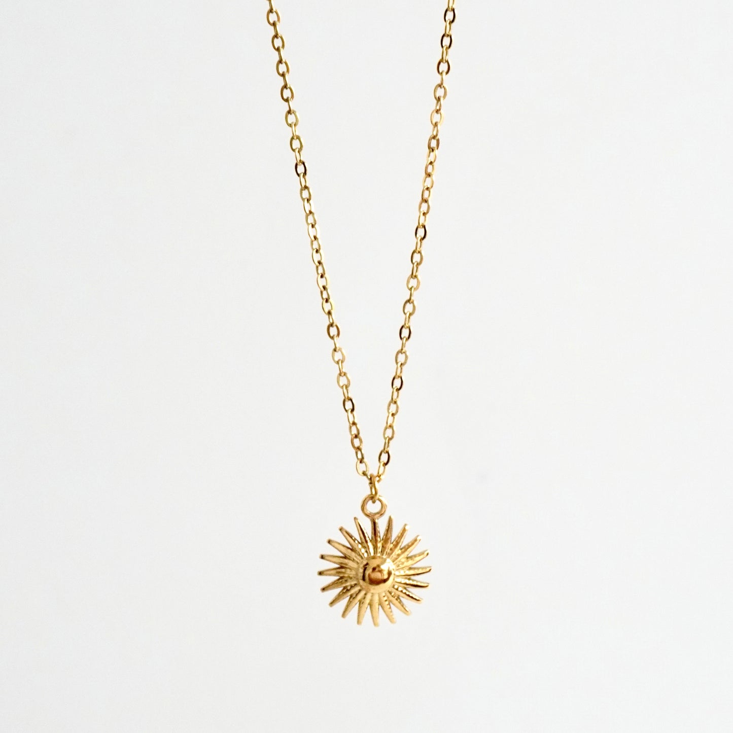 Cadena con dije de sol
