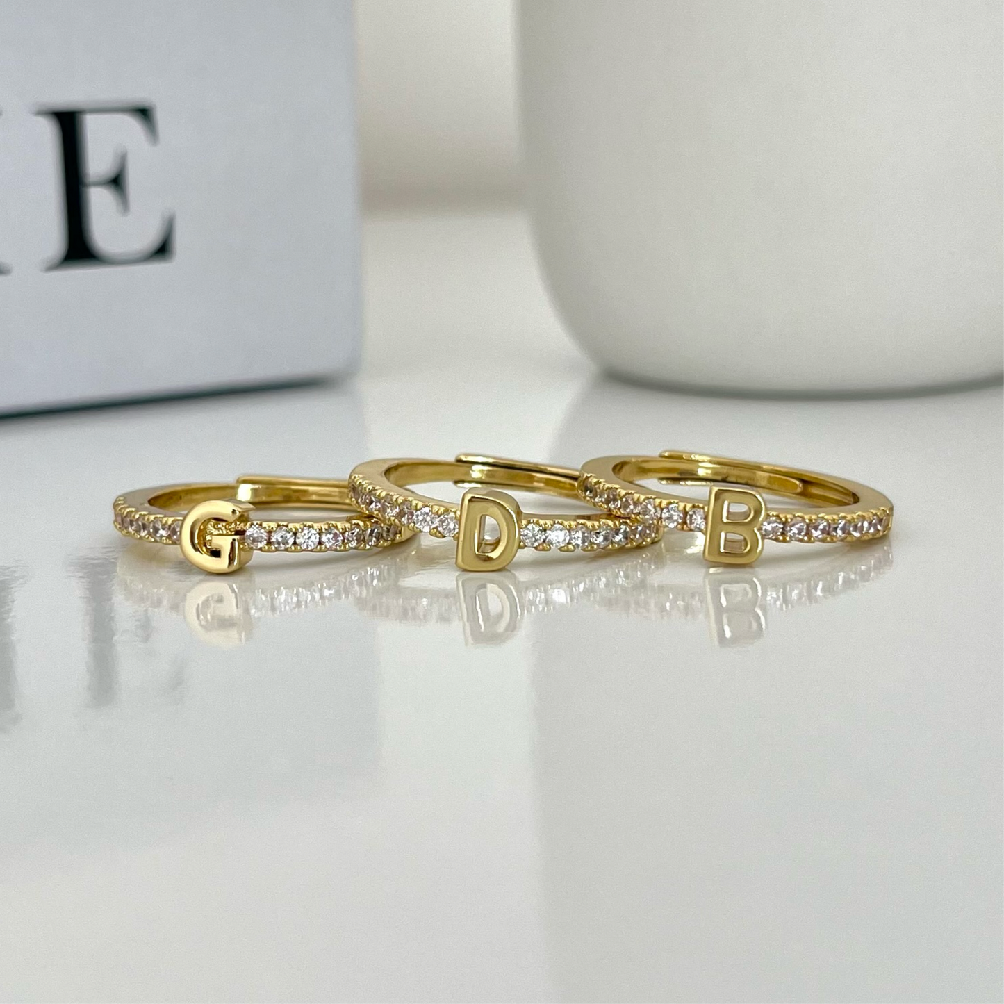 Anillo de inicial ajustable