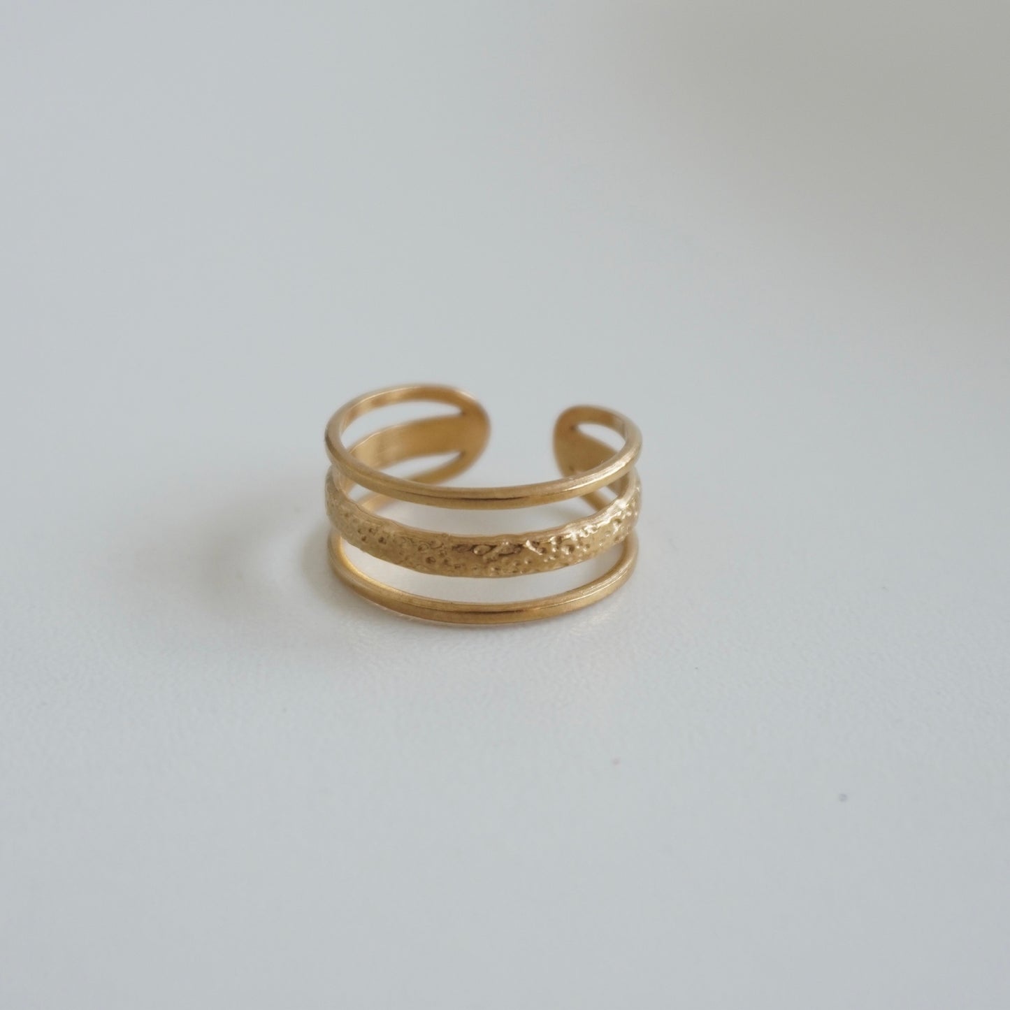 Anillo triple liso y textura