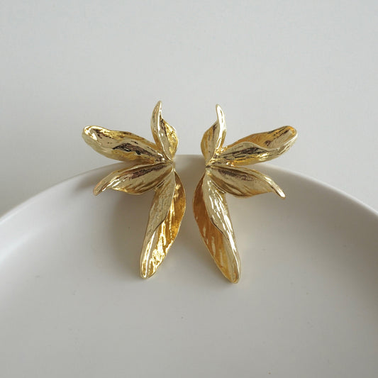 Aretes media flor jumbo