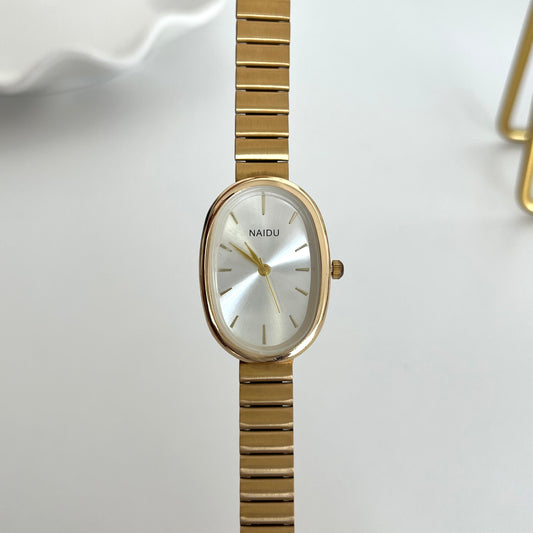 Reloj minimalista dorado