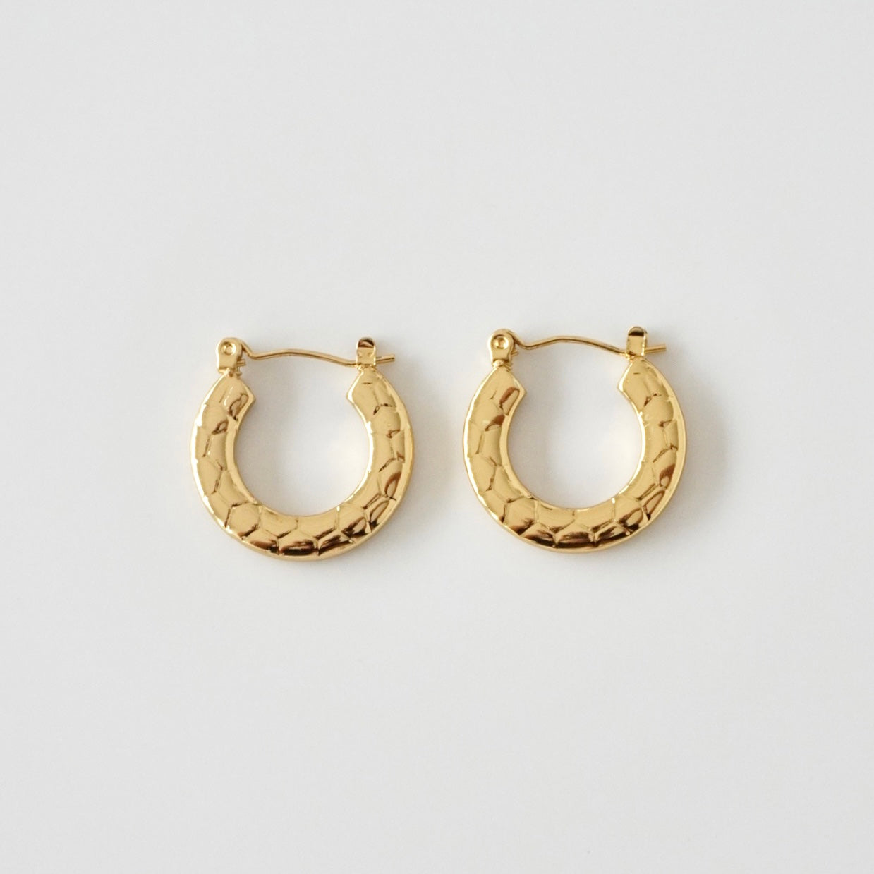 Hoops de broche con textura