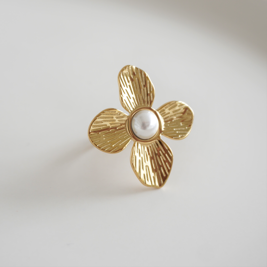 Anillo flor ajustable con perla