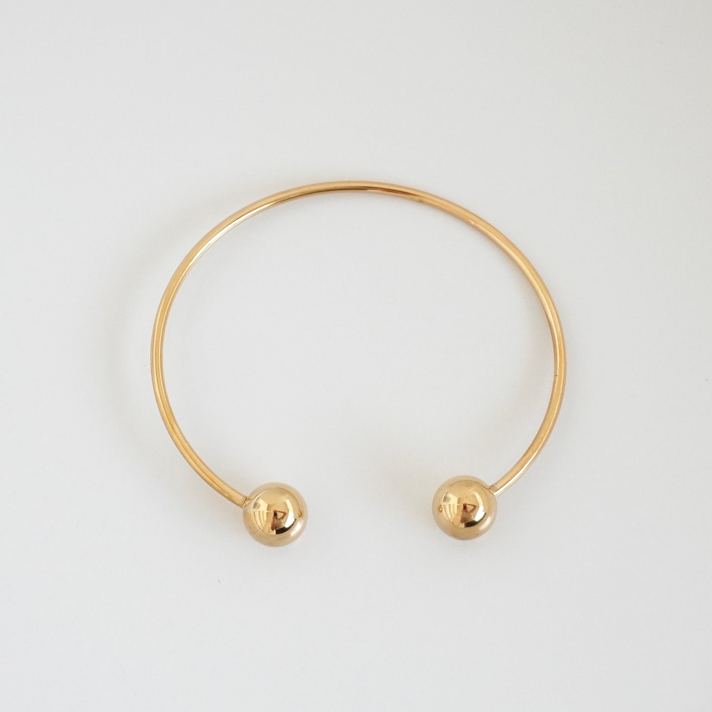 Pulsera rígida abierta bolitas