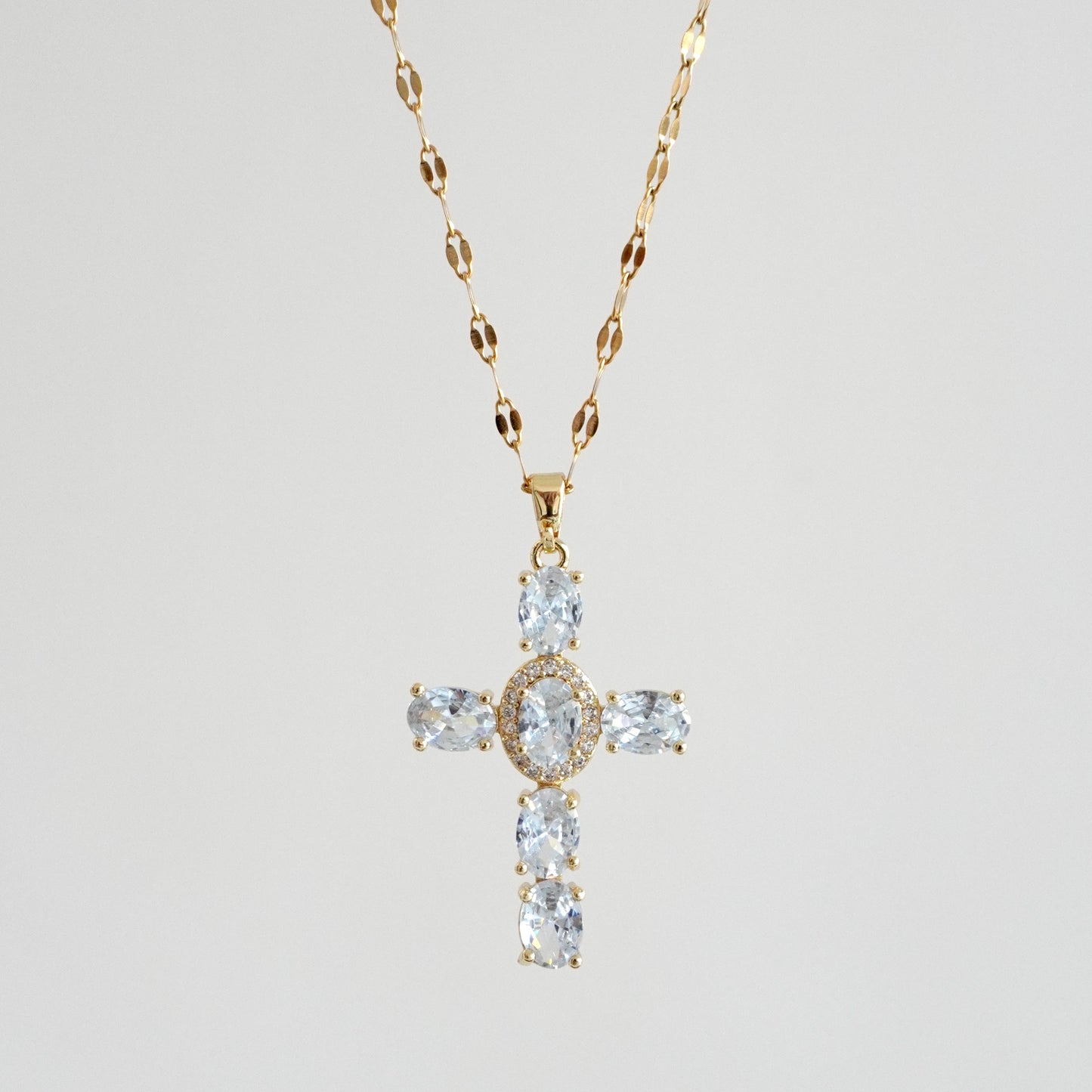 Cadena cruz zirconias óvalos