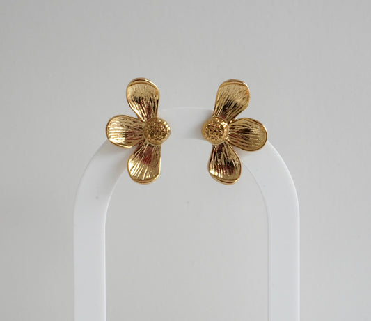 Aretes media flor dorados