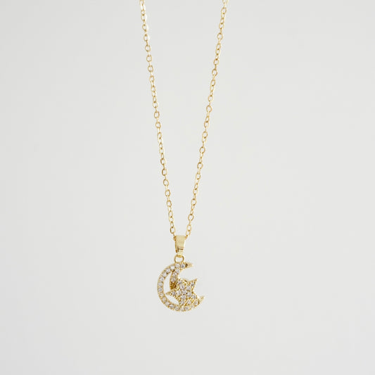 Cadena dije luna y estrella giratoria