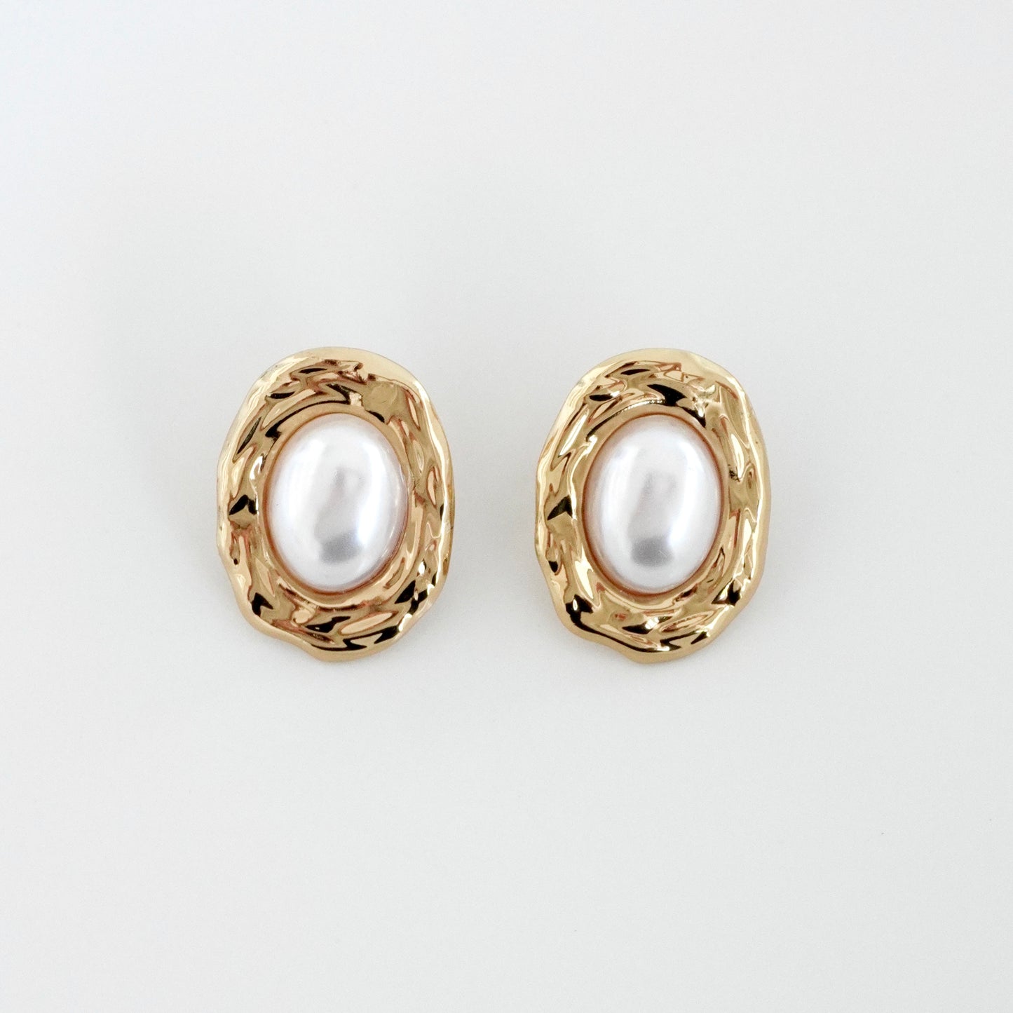 Aretes ovalados textura y perla