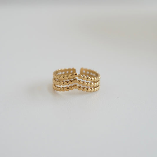 Anillo triple línea de puntos y picos