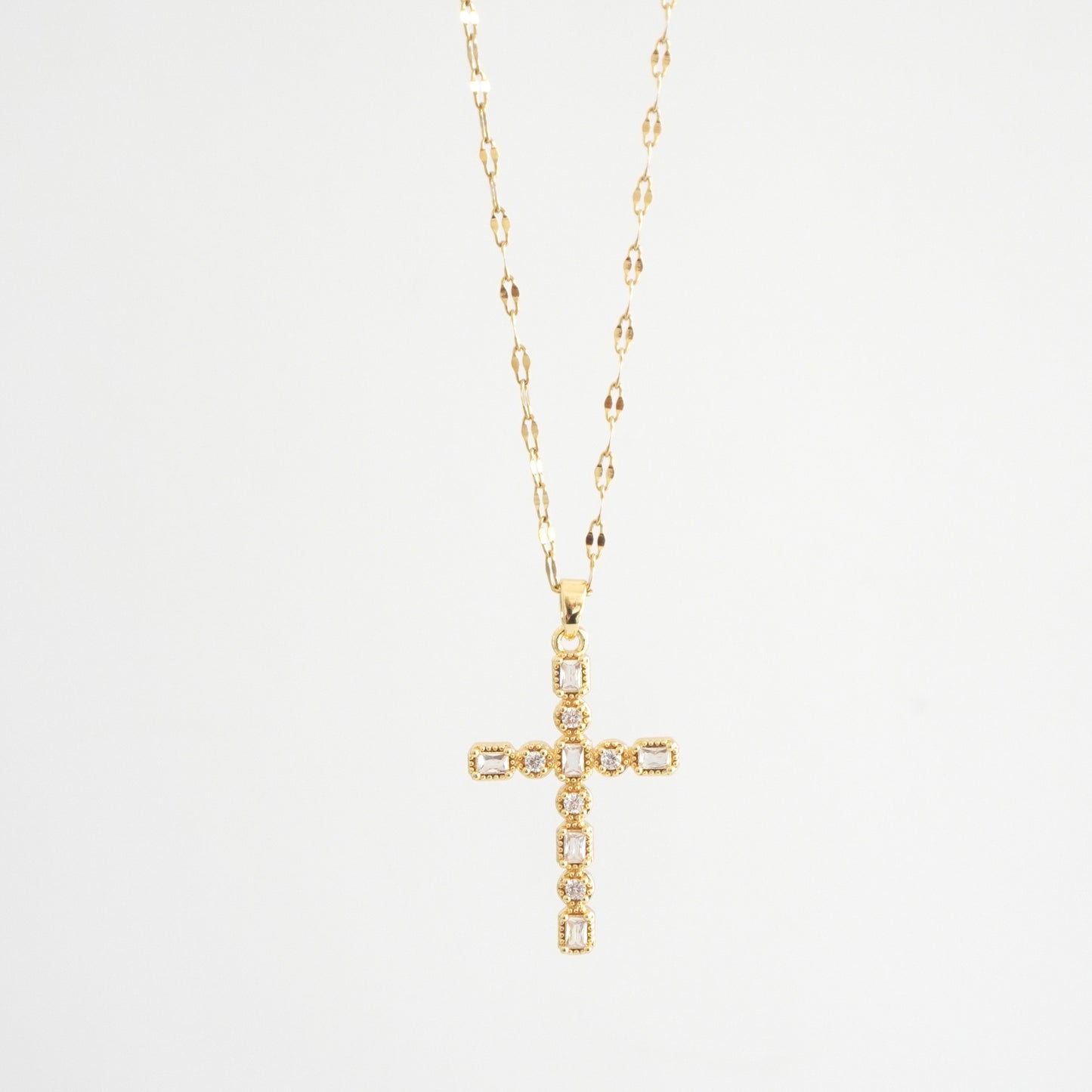 Cadena cruz de zirconias
